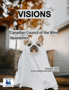 A dog wearing a white ghost halloween costume with cutouts at its nose and eyes looks up. A tree with warm fall-coloured leaves is in the back.